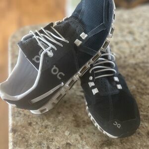 On Running Charcoal and White Athletic Shoes